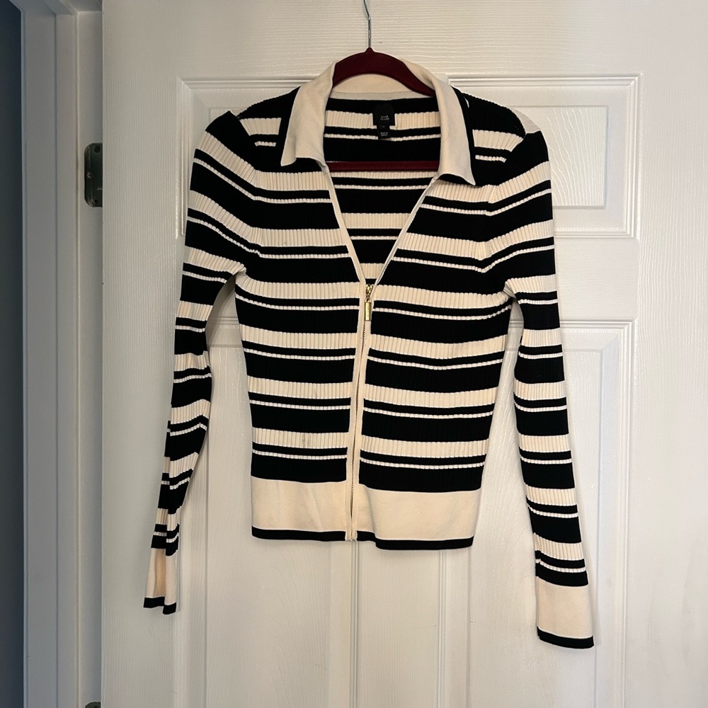Navy and white striped zipper up, size 14 but cut very very small, more like a 6